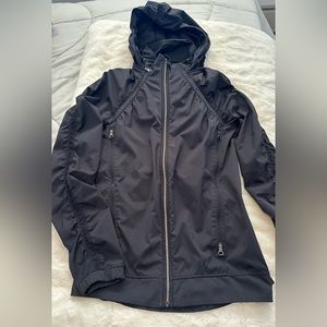 Lululemon black lightweight running jacket. Hood, packable.